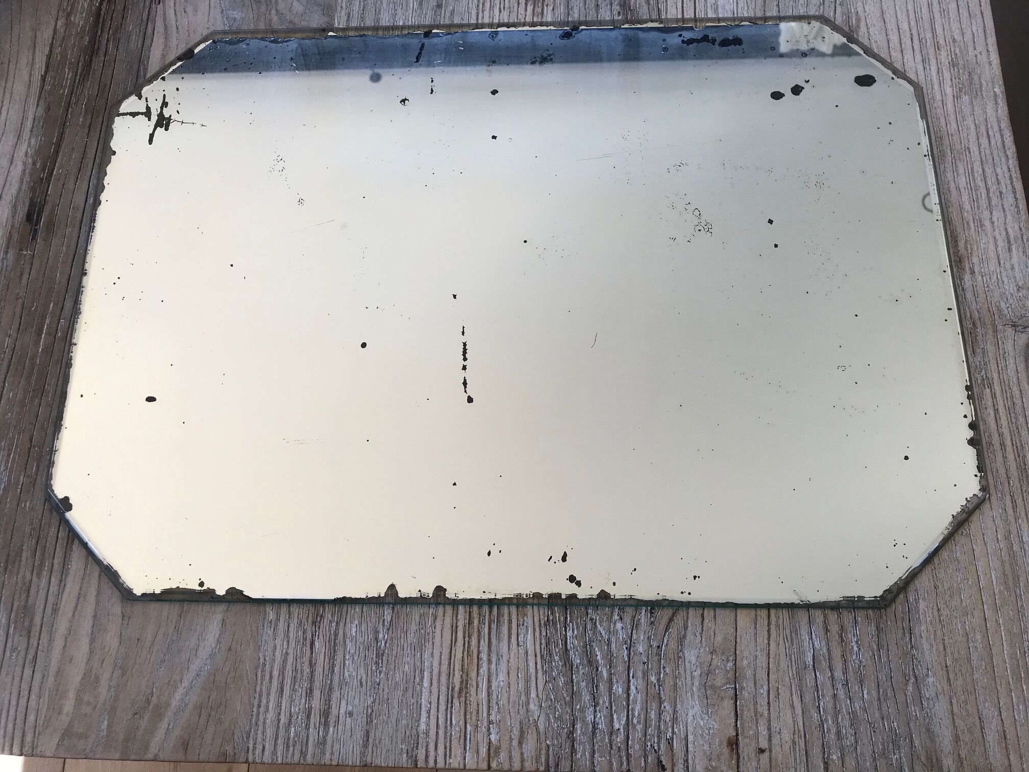 Old octagonal beveled mirror