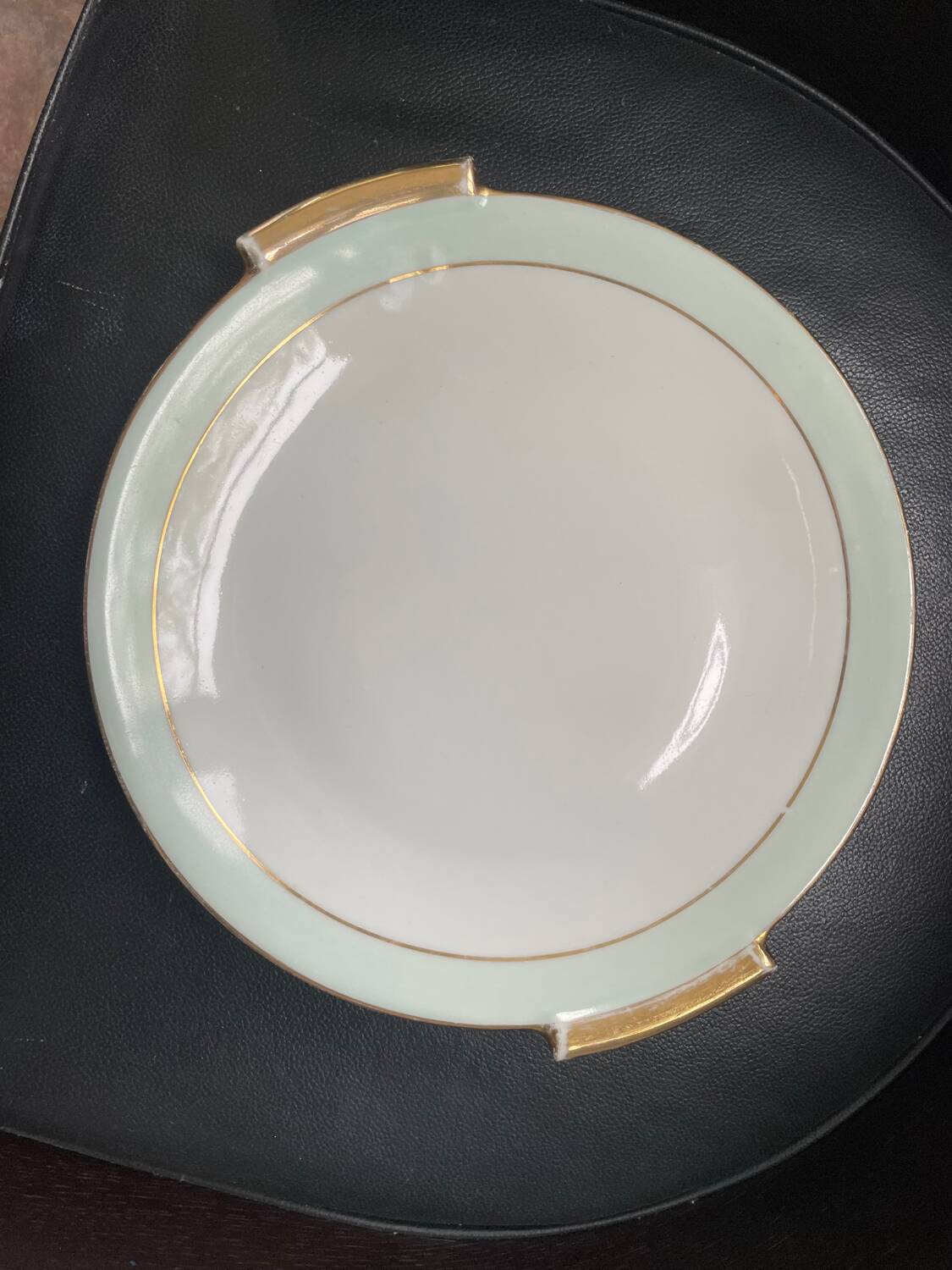 Round dish in pn france art deco ceciladon porcelain
