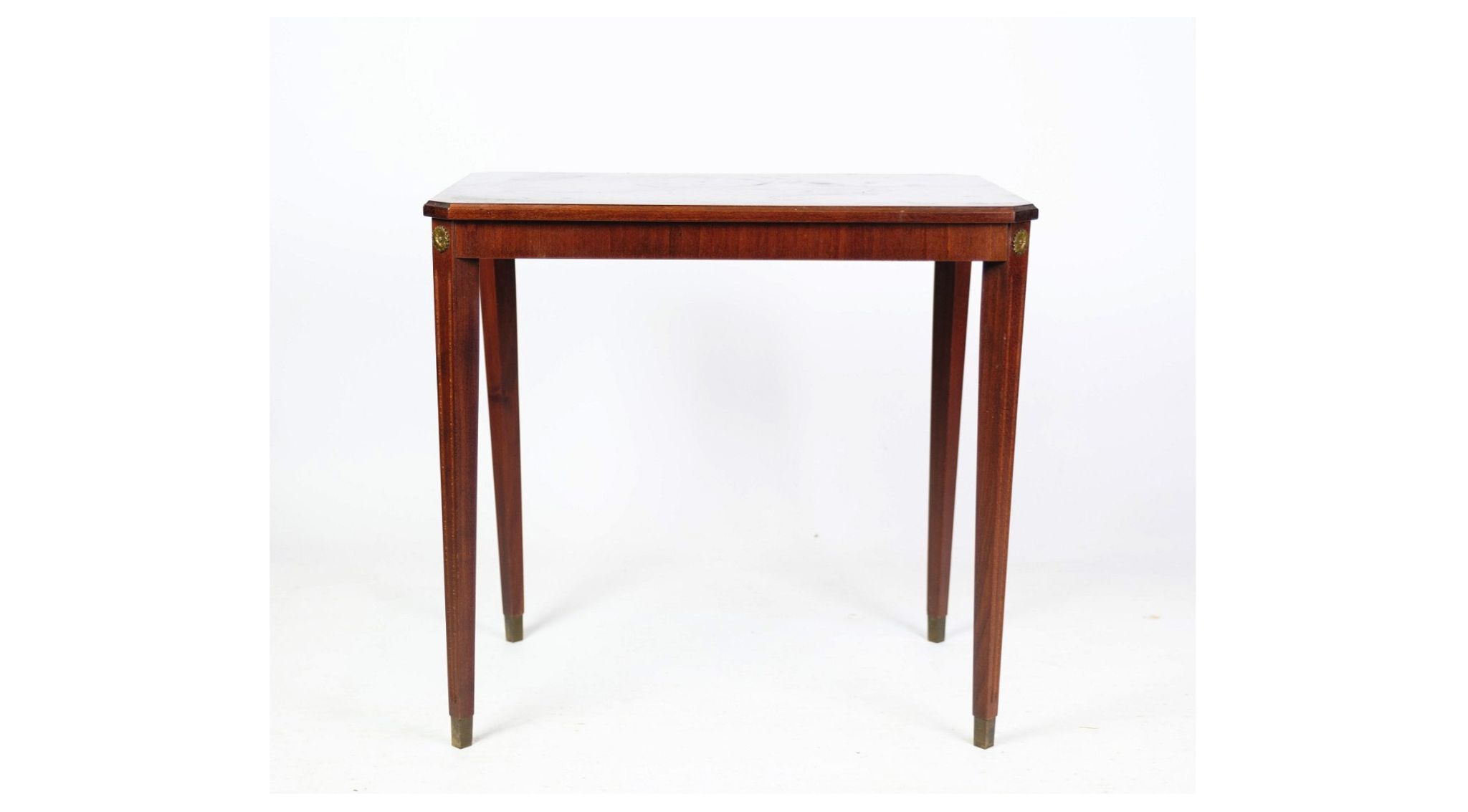Side table decorated with bronze ornaments in light mahogany