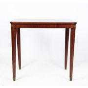 Side table decorated with bronze ornaments in light mahogany