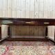 Bureau plat de style Empire en acajou et cuir vert