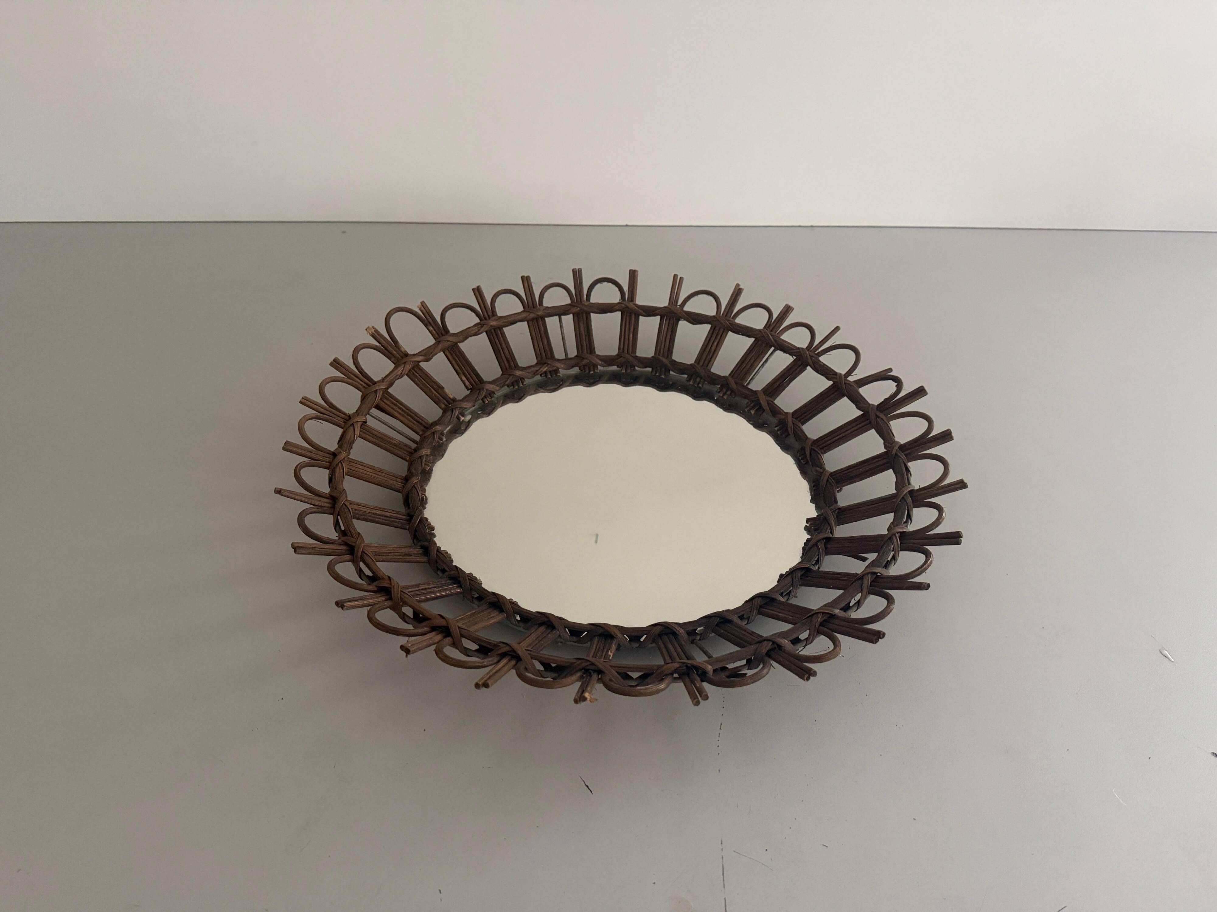 Round wall mirror with a modern mid-century wooden frame, 1960s, Germany.