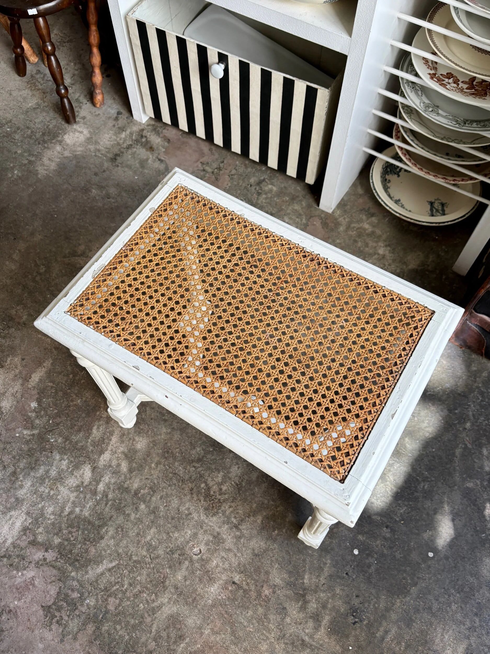 Stool, small wooden piano bench in white with caning.