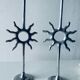 Pair of sun candle holders