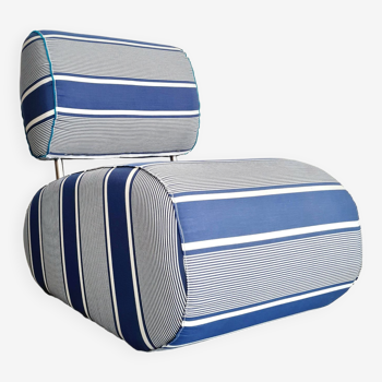 Curved armchair with blue and white stripes