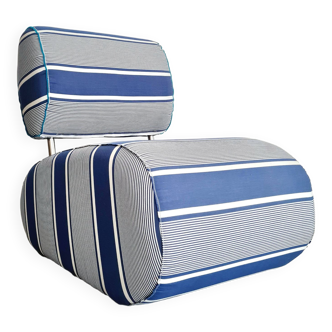 Curved armchair with blue and white stripes