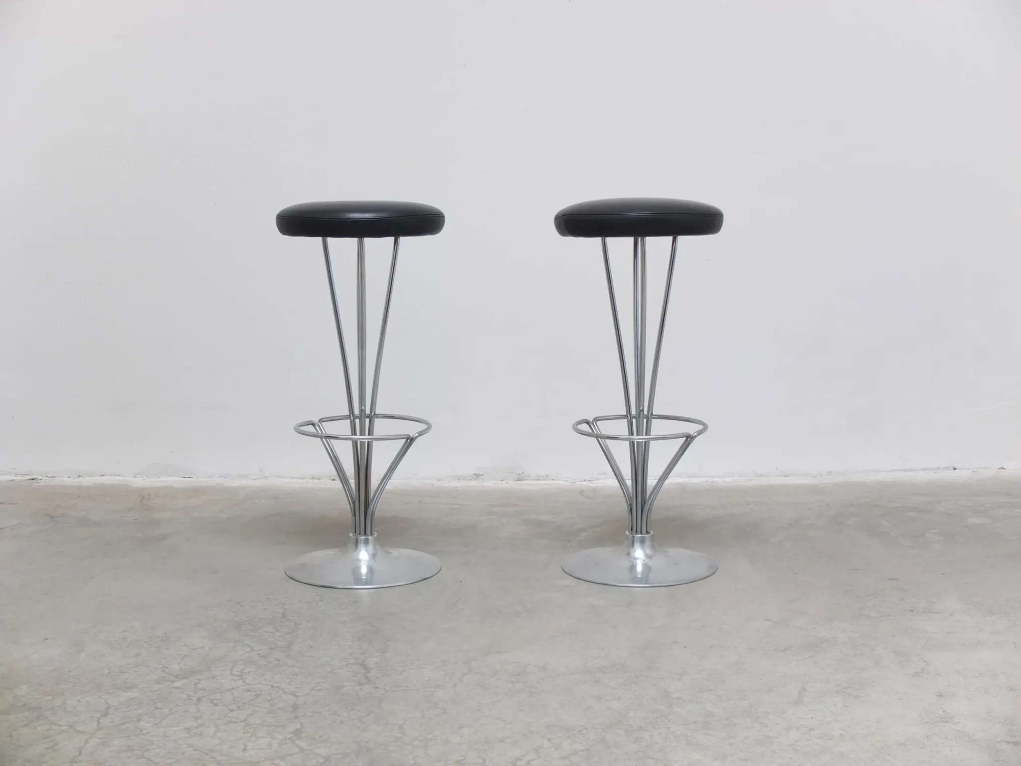 Danish modern pair of bar stools by Piet Hein for Fritz Hansen, 1960s