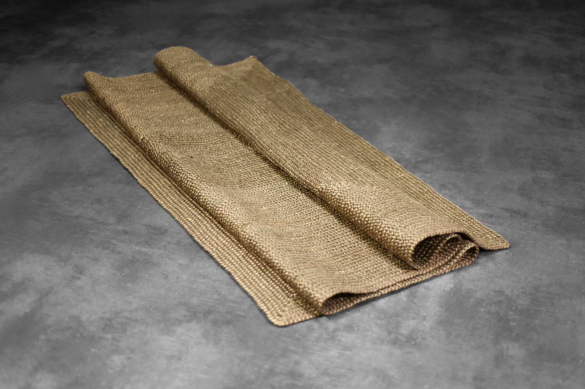 Brown flat-woven jute Indian rug, 1970.