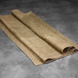 Brown flat-woven jute Indian rug, 1970.