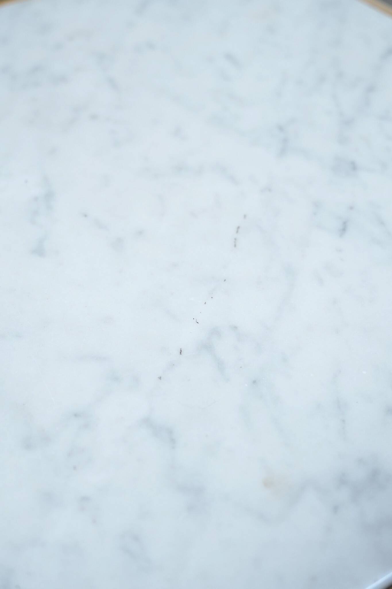 Antique wooden 1-door hallway/nightstand with a light marble top