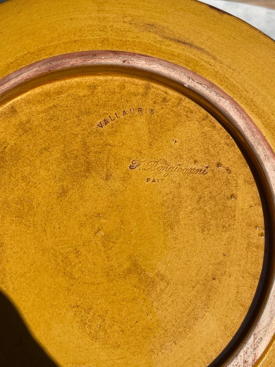 Pair of green glazed stoneware ceramic plates