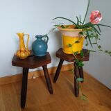 2 wooden tripod stools