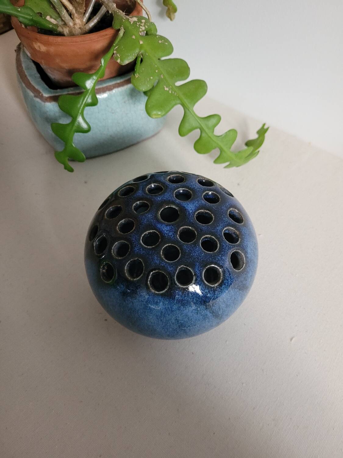 Glazed ceramic flower holder