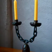 Sculpted wooden and wrought iron brutalist double chandelier from the 1960s.