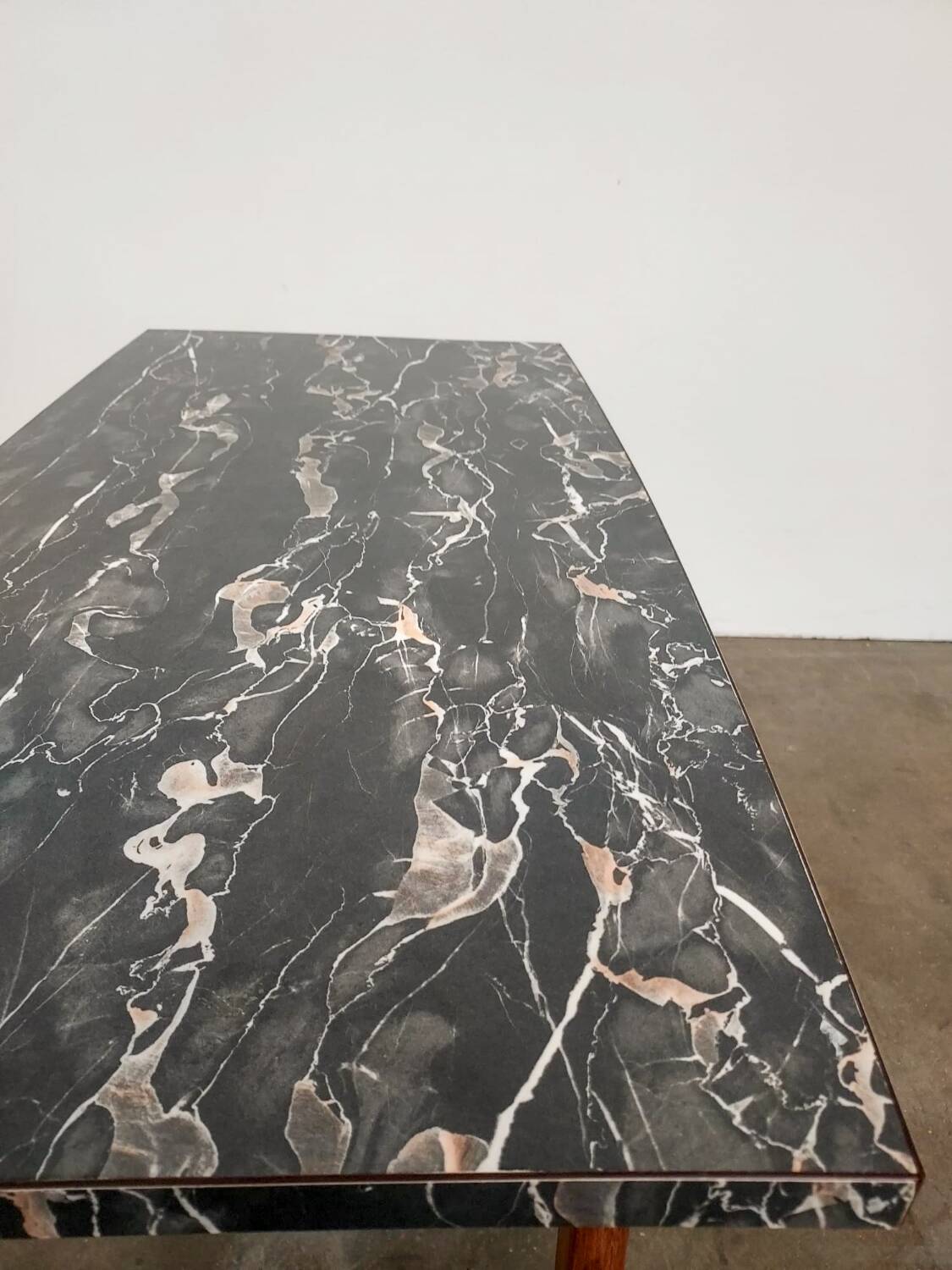 Marble effect Formica coffee table - flared legs