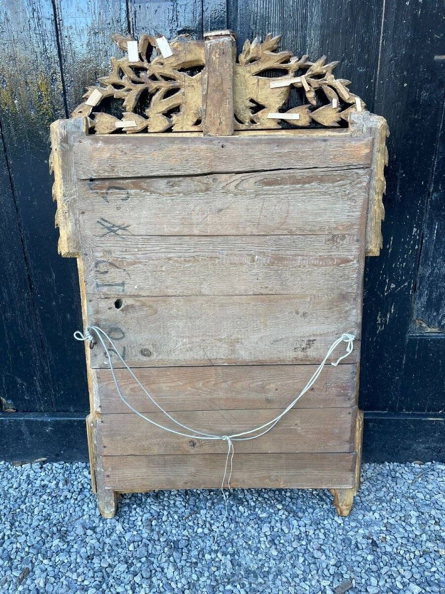 Louis XVI mirror in carved and gilded wood, 18th century