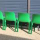 Set of 4 green Selene Magistretti chairs.
