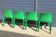 Set of 4 green Selene Magistretti chairs.