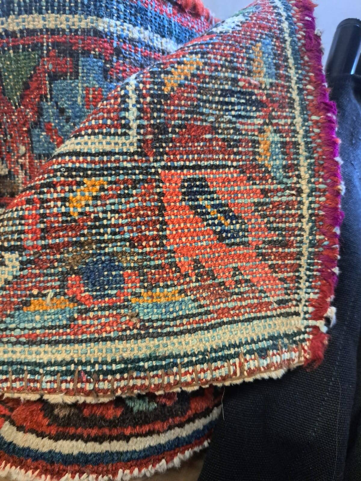 Ancient Persian carpet made of hand-woven wool. Very good condition.