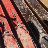 3 pairs of old skis