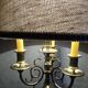 Copper candlesticks adapted as bedside lamps, the pair.
