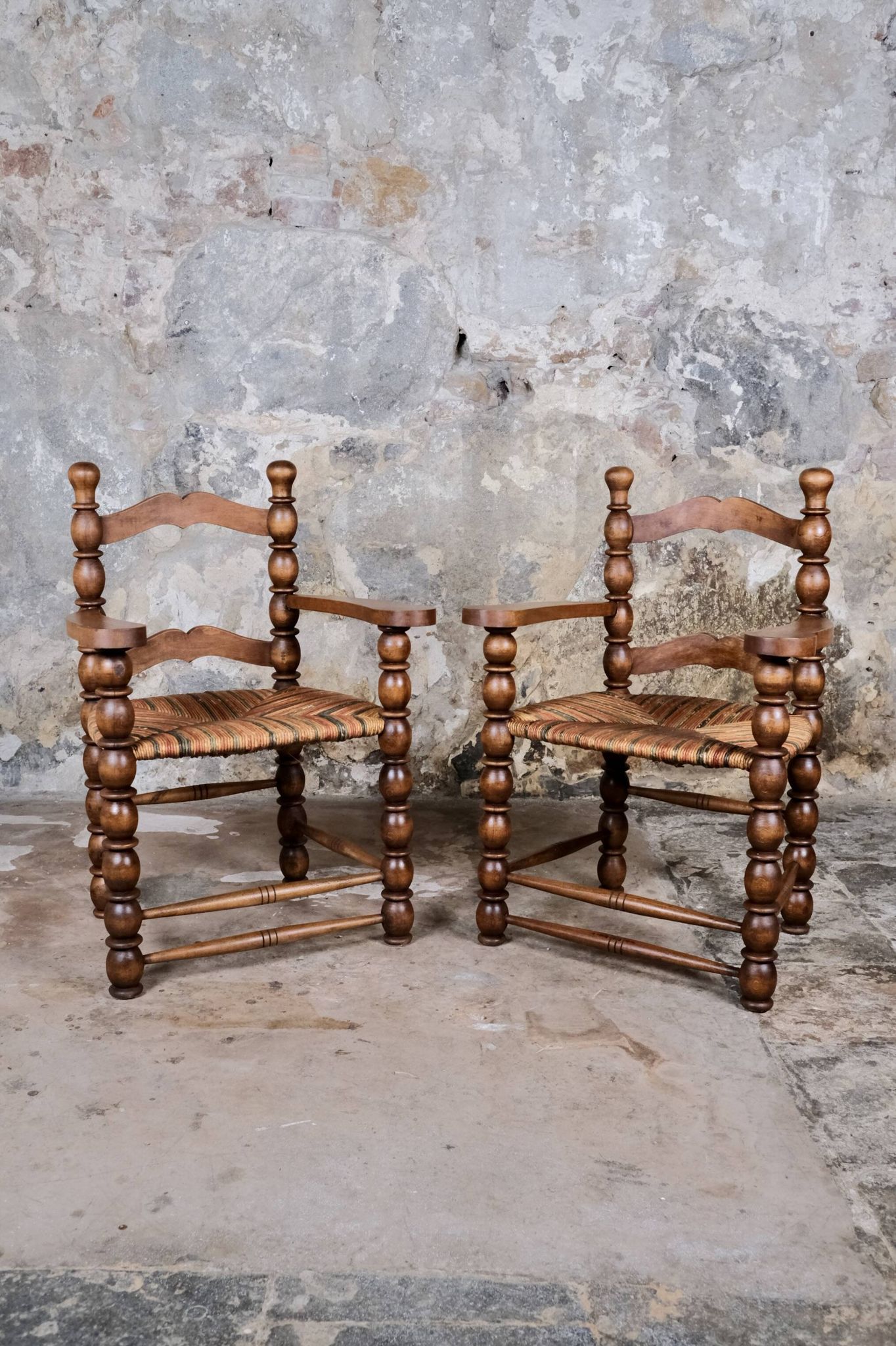 Pair of turned wooden spool armchairs, mid-20th century, France