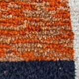Handmade wool rug in colourful patterns, size 150x250 cm.
