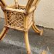 beautiful 1970s bamboo and rattan dining table with a glass top