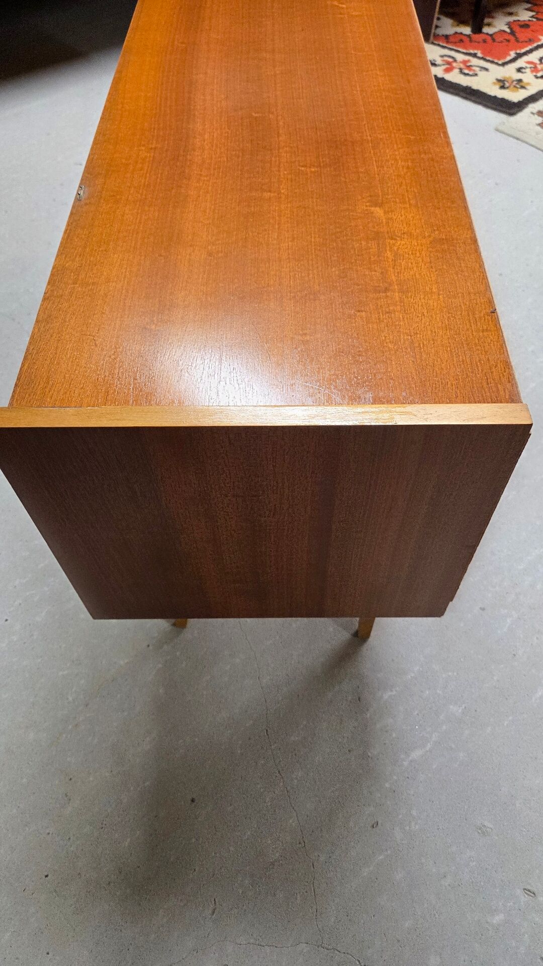 Small Scandinavian low sideboard 1960 vintage with tapered legs.