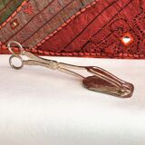 Wrought silver plated cake clips