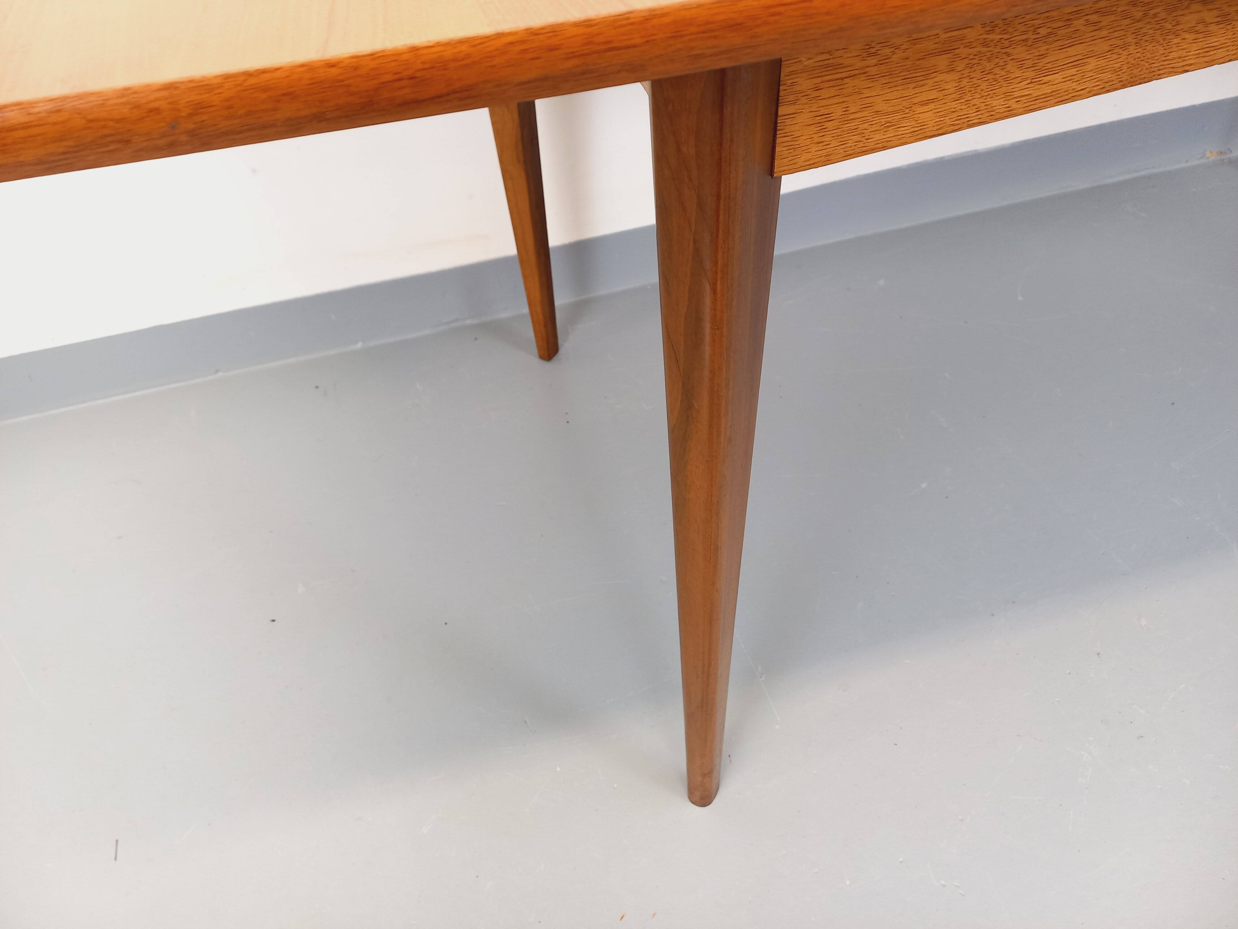 Rectangular dining table in vintage Scandinavian style from the 50s and 60s, made of teak.