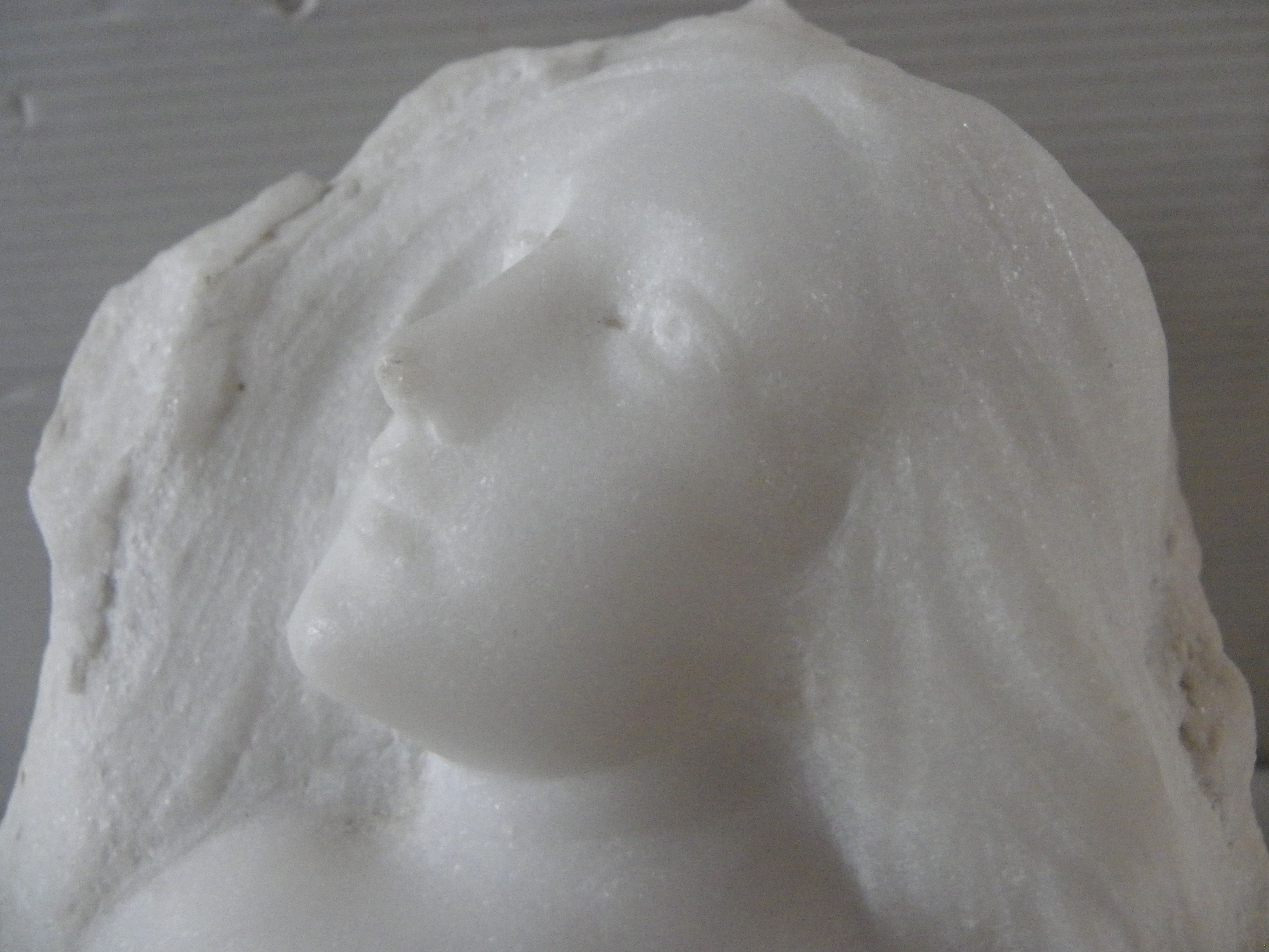 Sculpture face of woman in marble block 13 x 12 x 8 cm