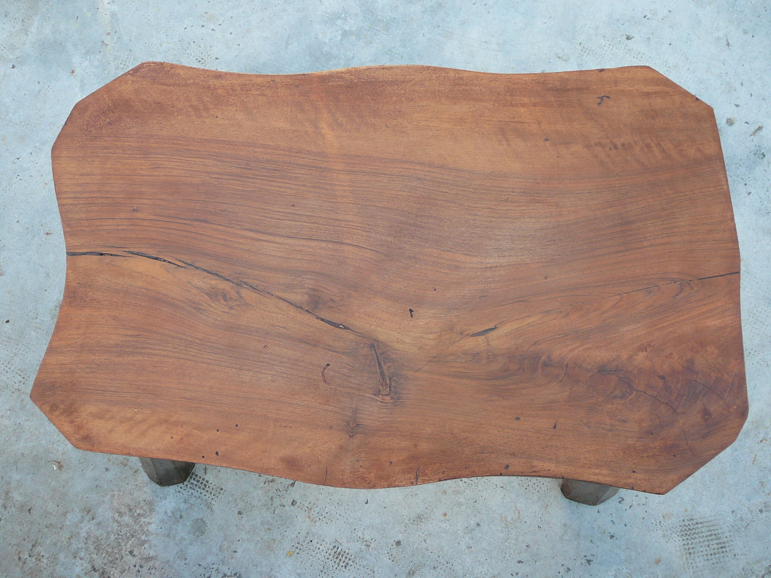 Free-form brutalist massive walnut side table