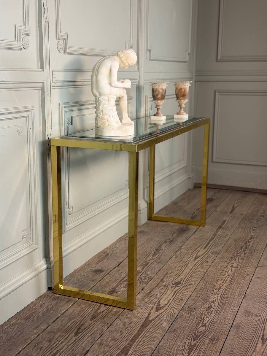 Golden and chrome metal console, bevelled glass, circa 1980.