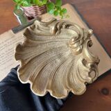 Bronze “shell” pocket emptier