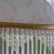 Lustrous suspension in glass paste, glass and ceramic pendants.