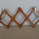 Folding wall coat rack