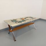 Vintage coffee table from the 60s and 70s in ceramic, chrome metal, and wood.