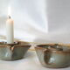 Pair of cellar rat candle holders in glazed sandstone