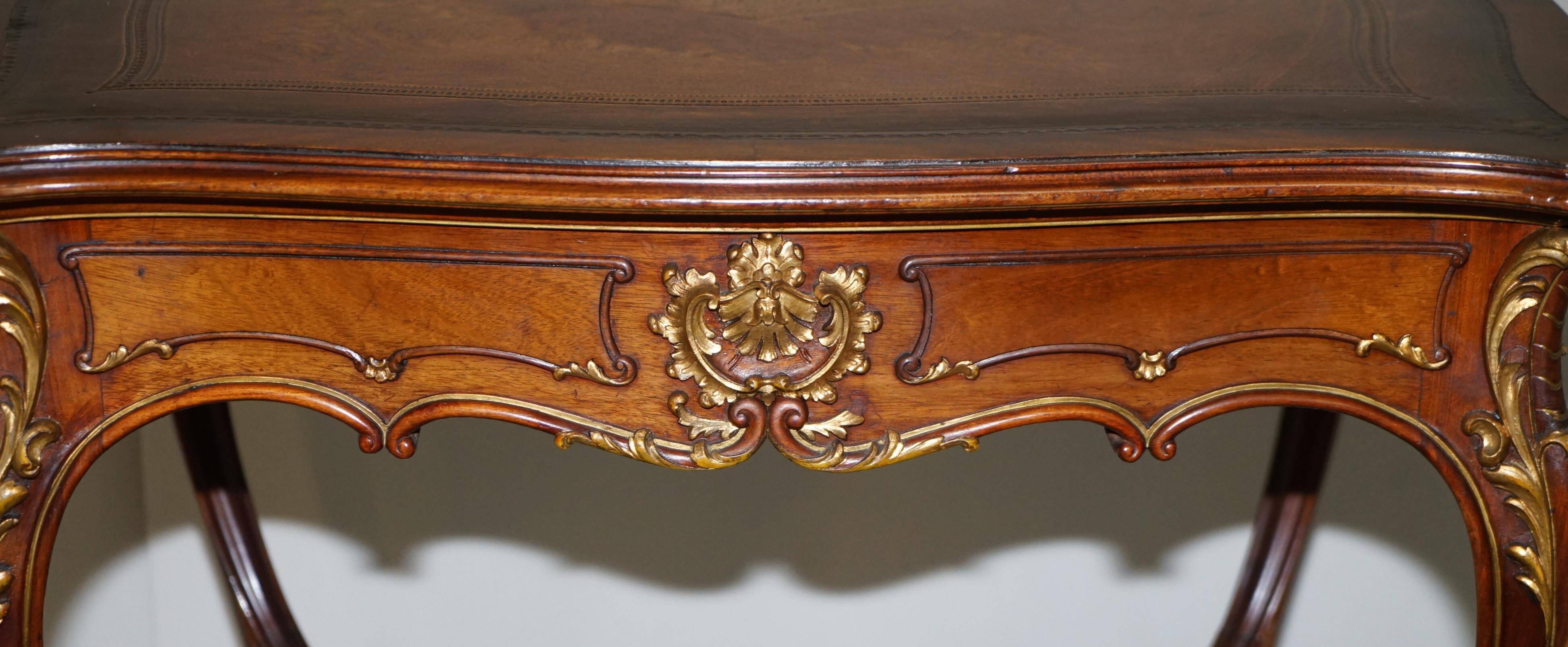 Pine desk with leather and gilding, late Victorian period around 1900.