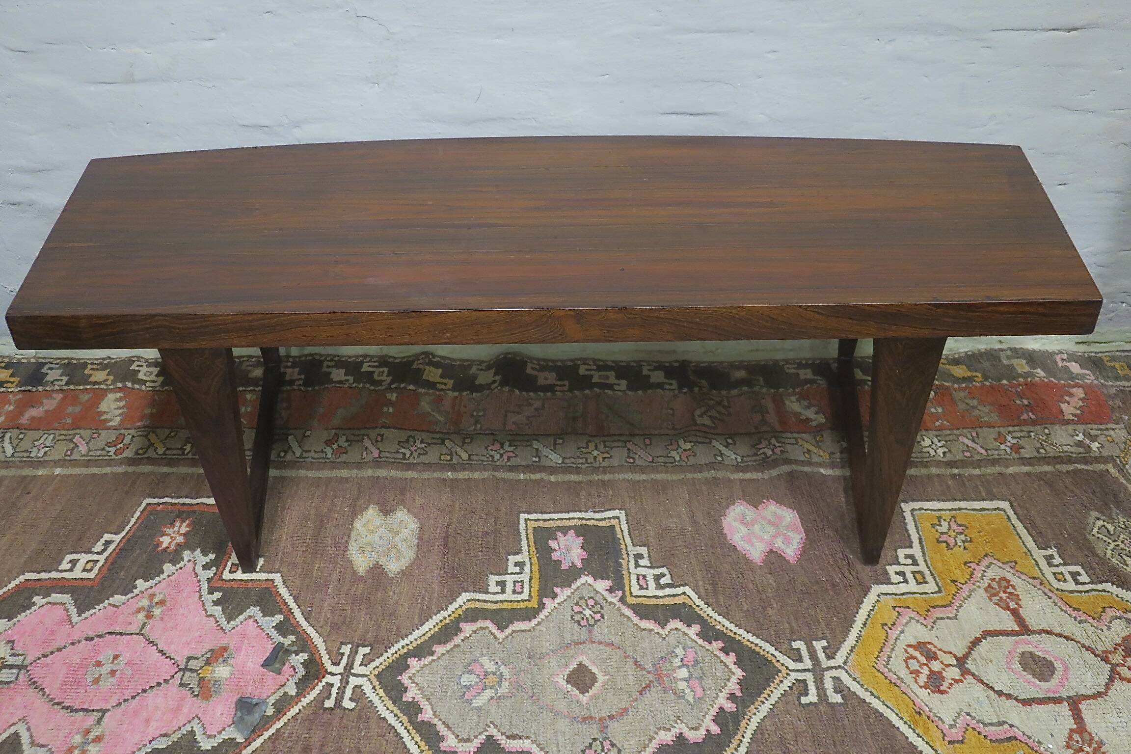 Danish rosewood curved coffee table by Leif Hansen, 1960s