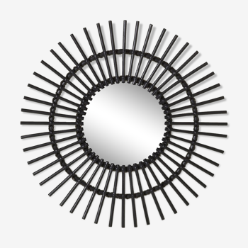 Round mirror shaped sun in rattan