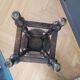 Antique wooden stool with turned legs.