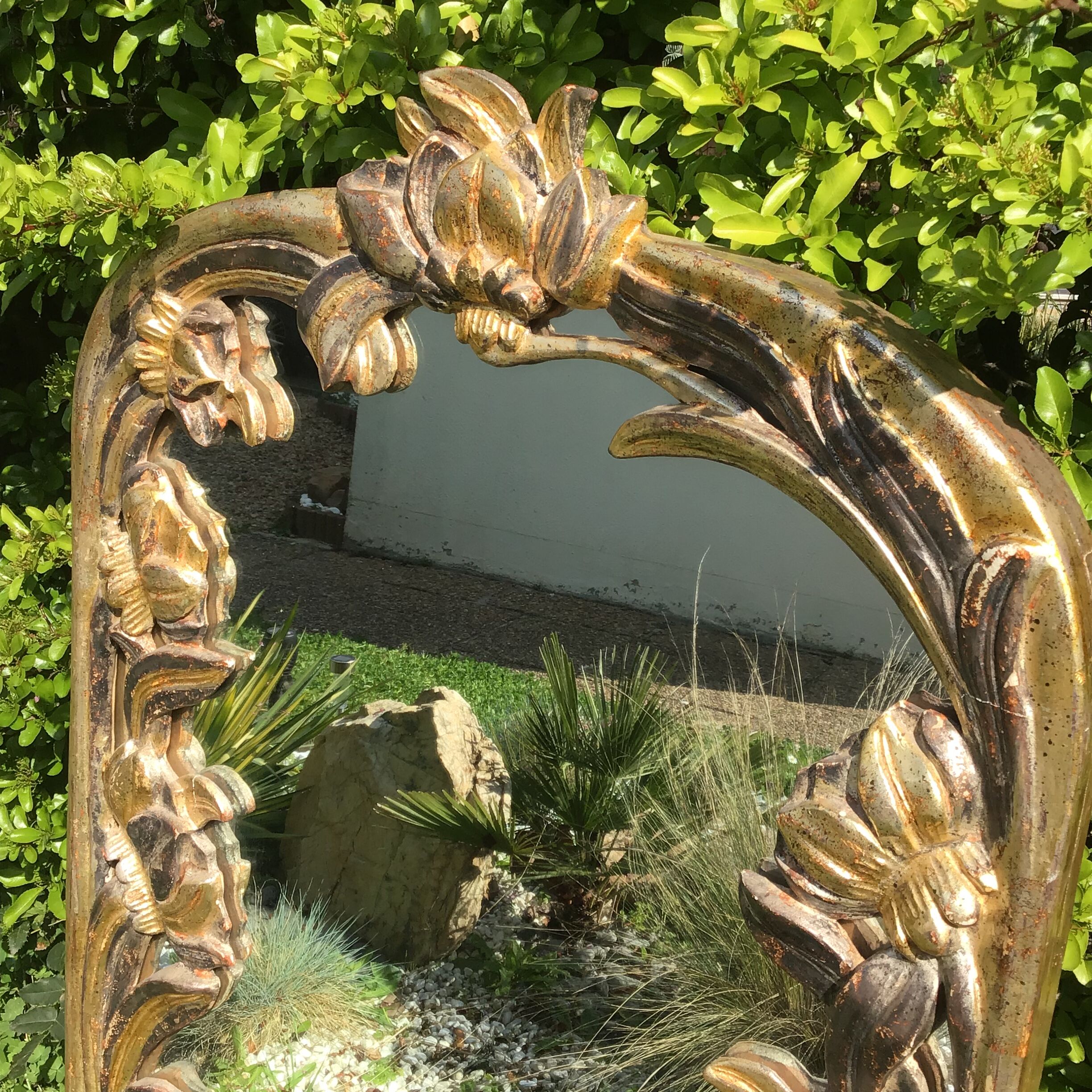 Glace en bois sculpté 130x64cm