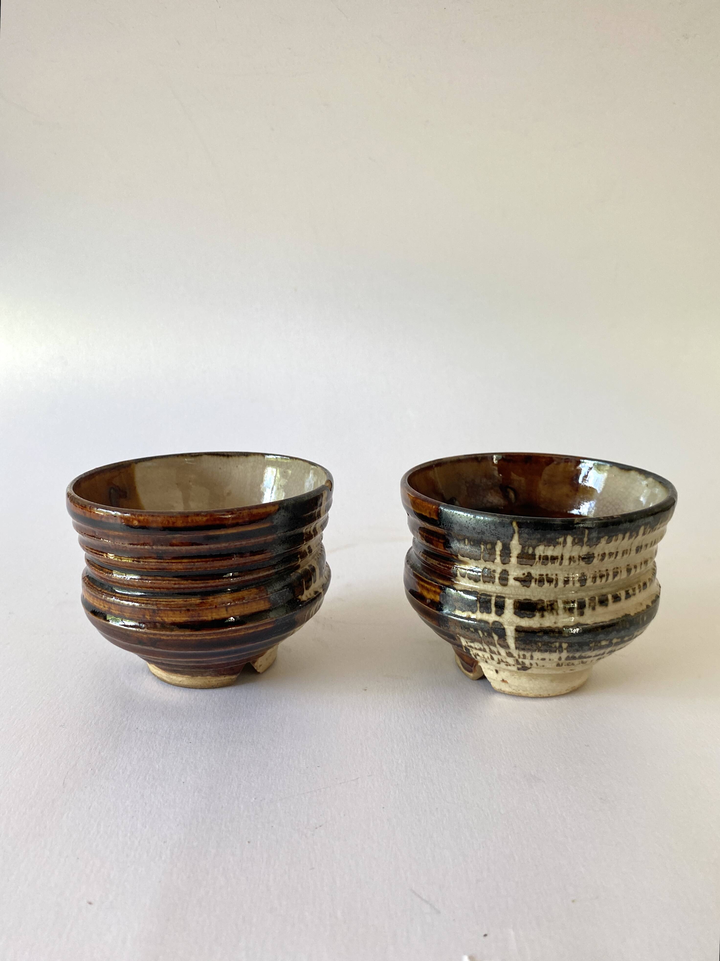 Duo of enamelled earthenware pots, Tunisia