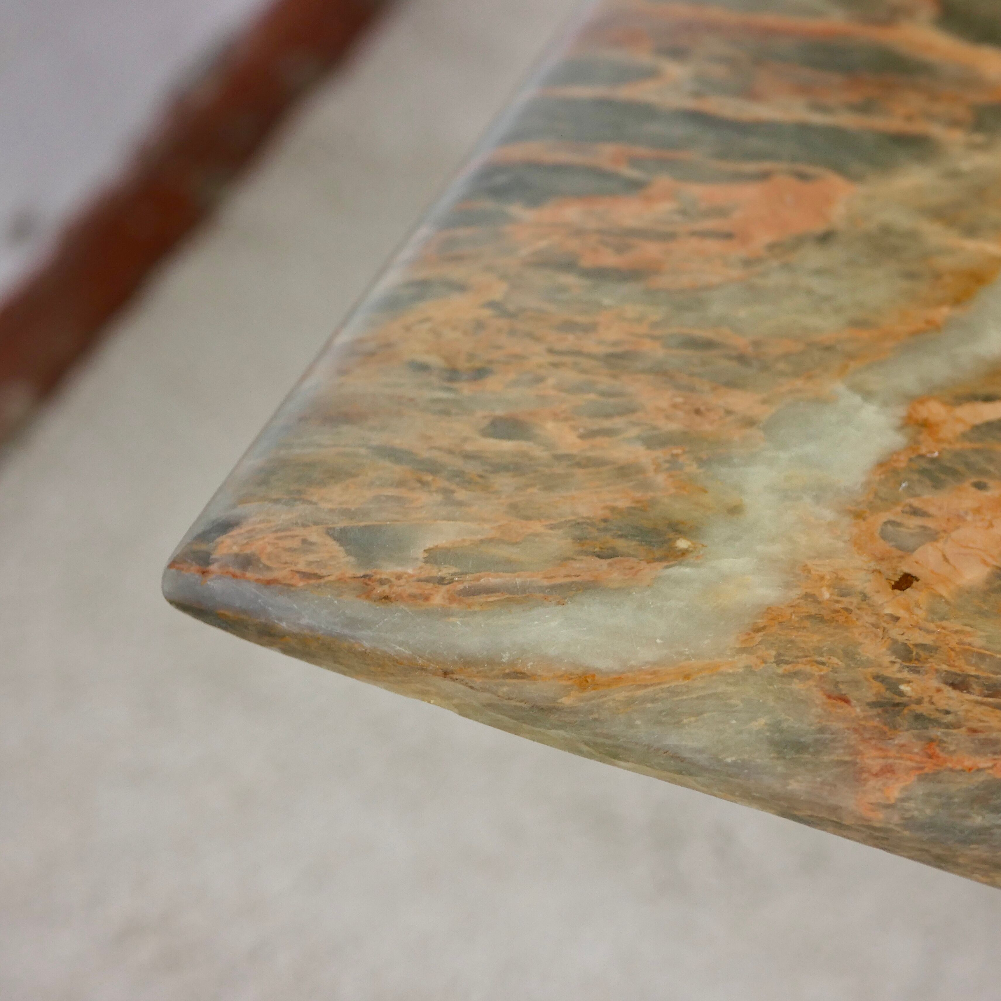 Coffee table in green marble and coral