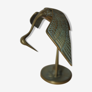Crane with brass spread wings