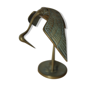 Crane with brass spread wings