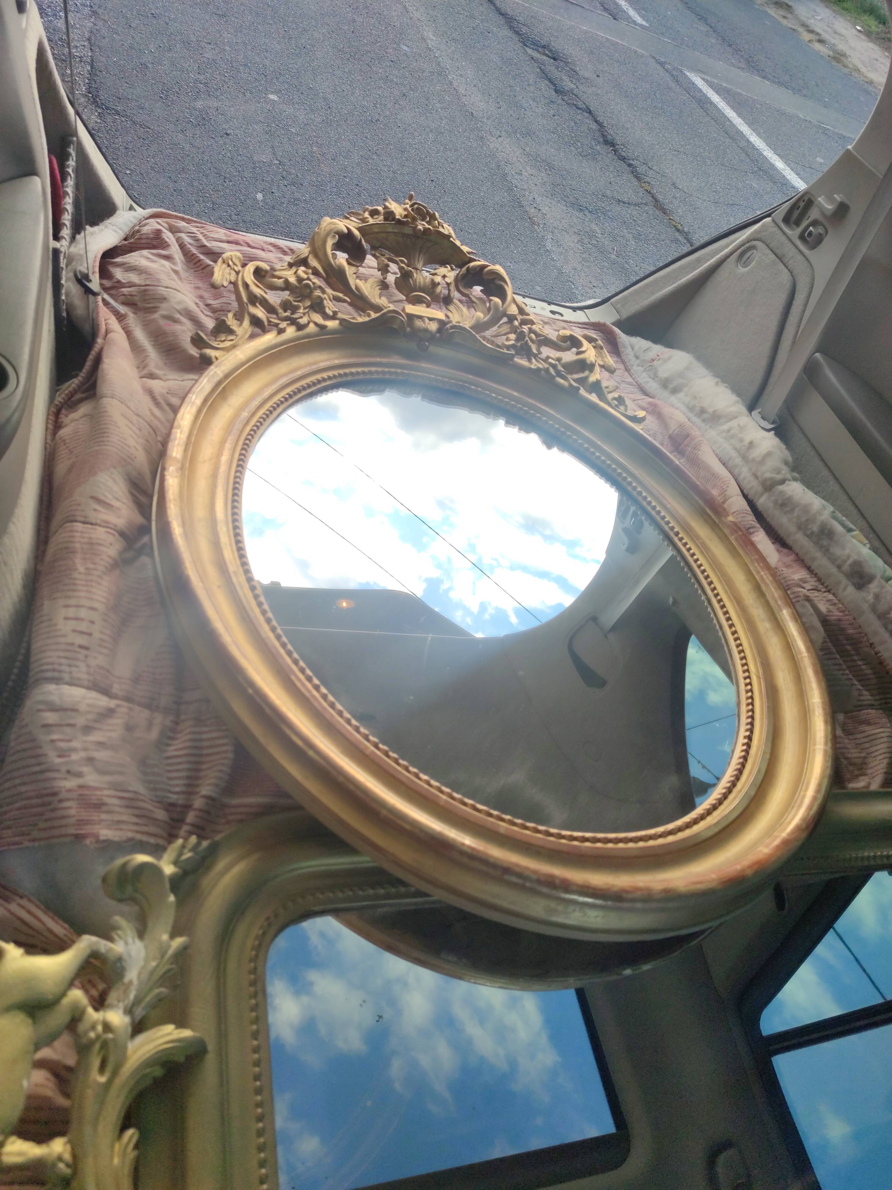 Mirror with a gilt medallion pediment, 1840