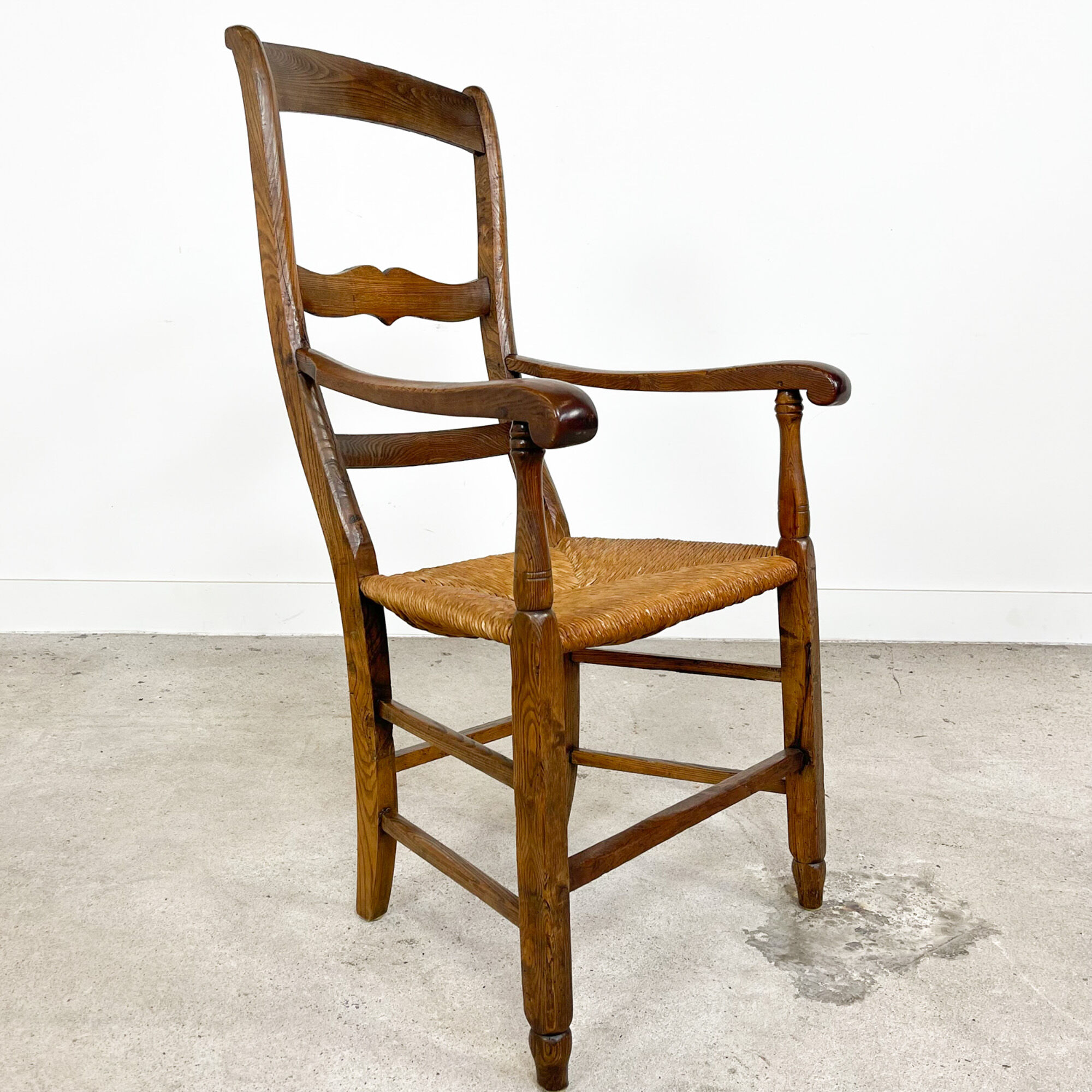 Antique oak armchair with cane seat 19th century